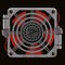 Red cooling system fan behind gray metal grille