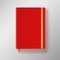 Red copybook with elastic band and gold bookmark.