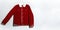 Red corduroy men`s jacket on gray background top view flat lay copy space. Male fashion, winter autumn spring jacket, youth