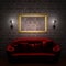 Red couch with empty frame and sconces