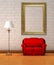 Red couch with standard lamp and ornate frame