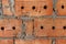 Red cracked brick wall background