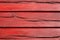 Red cracked wooden boarding