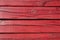 Red cracked wooden boarding
