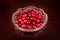 Red cranberry in crystal plate