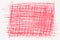 Red crayon drawing on white paper