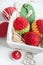 Red crocheted easter eggs in a shabby wooden box