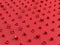 Red cubes, spheres, pyramids and geometrical shapes and form on red background. Abstract background. 3d render