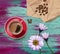 Red Cup Of Coffee, Coffee Beans And Camomile Background Illustration