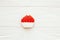 Red Cupcake icing cookie on white wood, flat lay with space for text. Delicious sweets. Happy Mothers day. Valentine day. Candy
