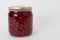 Red currant in a glass jar