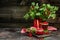 Red currant jam in jar. Canned fresh berries on a wooden background. banner, menu, recipe place for text