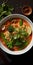 Red Curry Noodle Soup on wooden table