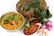 Red Curry with Pork and Pumpkin and Ingredient: Pumpkin, pork slice, Chili paste,. Basil, Thai Basil, Lemon Leaf, Kaffir lime leaf