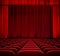 Red curtain on theater stage with red velvet seats