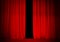 Red curtain on theatre or cinema stage