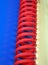 Red curved cable, blue surface,