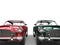 Red and dark green metallic vintage cars - front view - cut shot