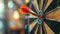 Red dart hits bullseye on target, symbolizing business success and investment goal