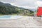 Red deckchair at the edge of an outdoor hydromassage pool, Italy