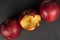 Red delicious apple on grey stone