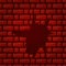 Red destroyed brick wall. Uneven edge. Chipped bricks. Kick into the wall.