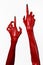 Red Devil\'s hands with black nails, red hands of Satan, Halloween theme, on a white background, isolated