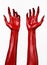 Red Devil\'s hands with black nails, red hands of Satan, Halloween theme, on a white background, isolated