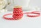 Red diagonal ribbon