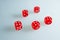 Red dice on the glass. Five dice with the value of `four`