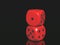 Red dices on black background