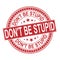 Red Don`t be stupid. blue round grunge vintage sign