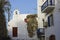 Red door, blue balconies and Orthodox Church