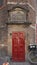 Red Door and Gable Stone for S. Lucas Gild, Waag House, Amsterdam, The Netherlands