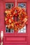 Red door with leaded glass windows and bright autumn wreath - closeup