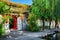 Red doors leading into courtyard of Chinese house, Dali Old Town