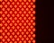 Red dot led lights on black. Red glowing circles on black. Checkerboard pattern. Background, design, graphics resources