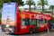 Red double decker sightseeing bus Nice Le Grand Tour in city center, Nice, France