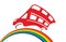 Red doubledecker rides by rainbow