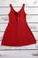 Red dress with keyhole neckline.