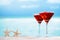 Red drink on beach , ocean ,white sand beach and seascape