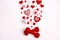 Red dumbbell with hearts and gift boxes on white background