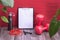 Red dumbbells, water bottle and jump rope, note board and large green leaves