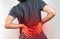 Red effect on lower back pain - Man pressing back