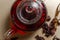 Red egyptian karkade tea in teapot, top view