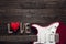 Red electric guitar with the word love and heart on a dark woode