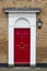 Red elegant residential apartment door