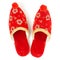 Red embroidered Turkish slippers isolated on white