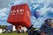 Red, Enormous, Cube-shaped Hot Air Balloon, Inflated and Ready to Fly.