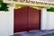 Red entrance portal design home metal aluminum gate of modern suburb house